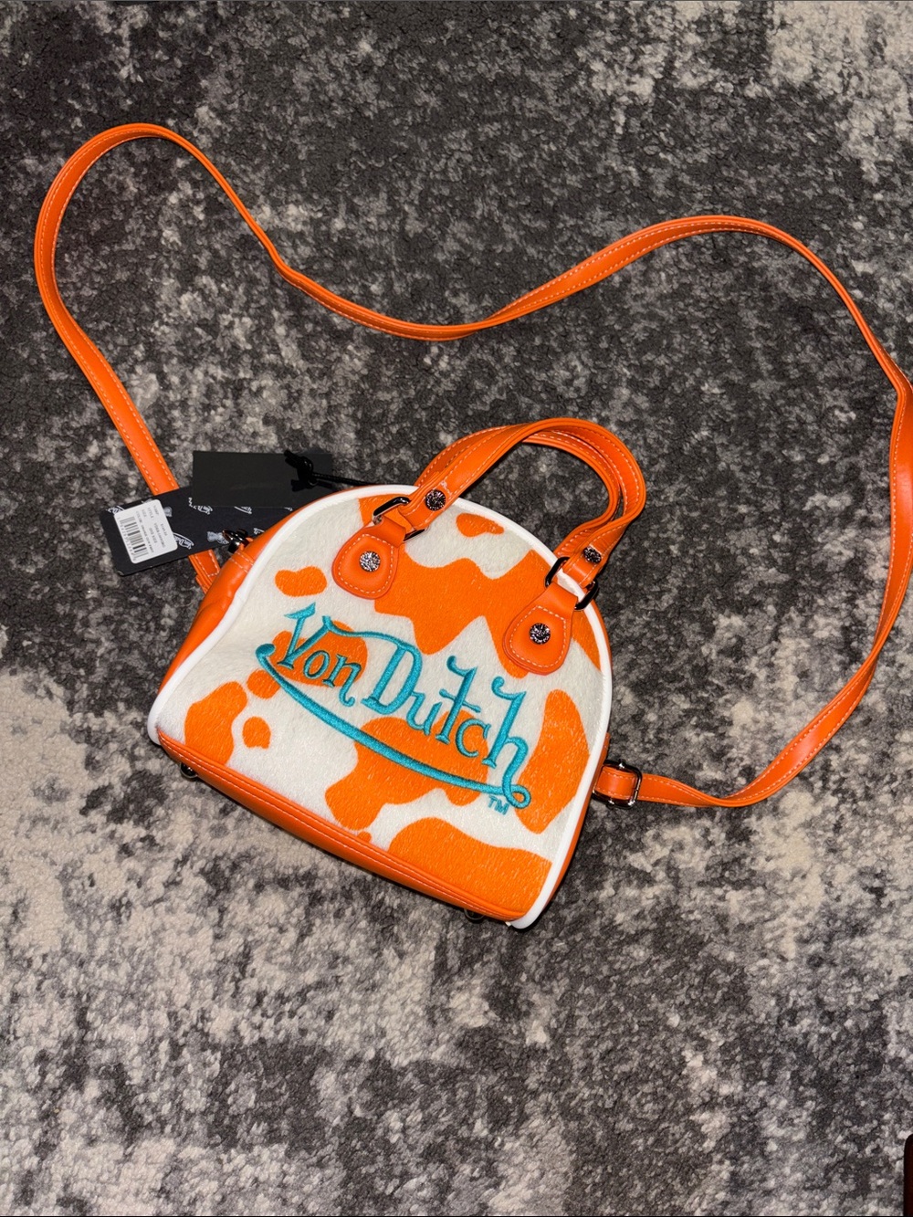 Von Dutch Orange & White Cow Pattern Mini Satchel with Teal Logo